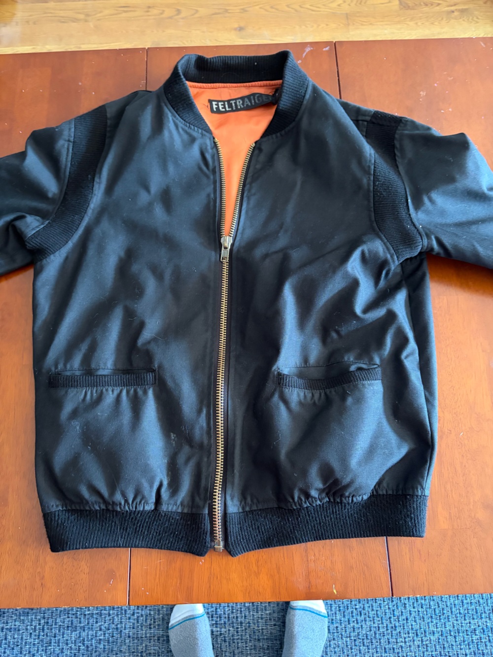 Black Bomber Jacket with Orange Lining